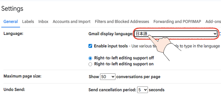 Gmailの設定画面で、言語を日本語に変更する操作手順。